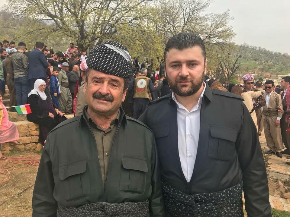 Aram Balatayi (right) stands for a photo next to his father, who committed suicide recently. (Photo: Aram Balatayi / Facebook)