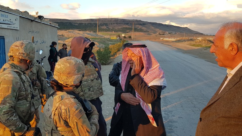 Coalition soldiers talk to village elders in Hemze Beg, northeast Syria, February 17, 2021 (Wladimir van Wilgenburg/Kurdistan 24).