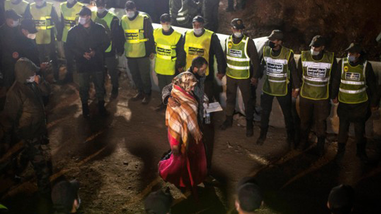 Parents of 5-year-old Rayan walk to the tunnel when their son’s body was lifted out of the well, Feb. 5, 2022. (Photo: AP)