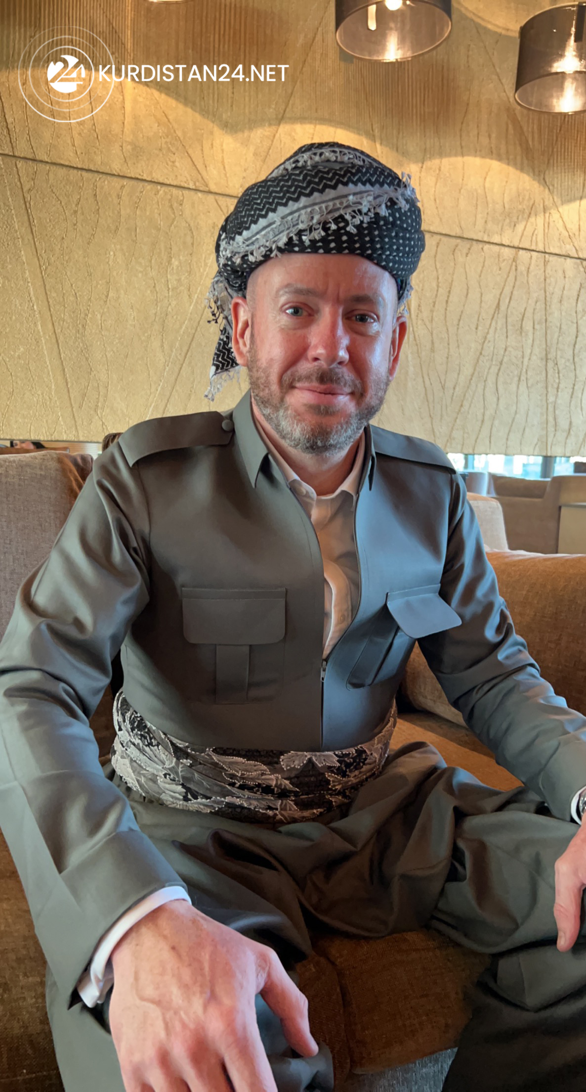 British Consul General in Erbil David Hunt poses for a photo in his newly tailored Kurdish outfit and turban, Feb. 11, 2022. (Photo: Mohammad Jubrail/Kurdistan 24)