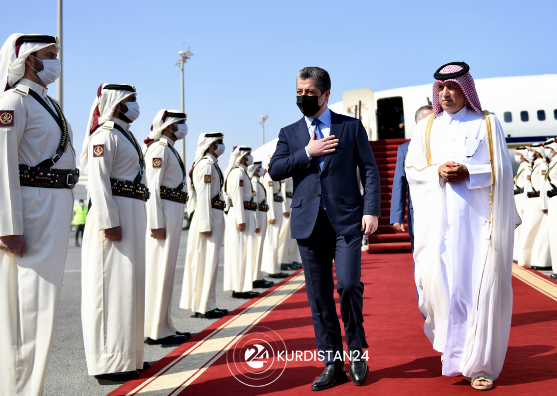PM Masrour Barzani (center) walks alongside Qatar’s Minister of State for Foreign Affairs Sultan bin Saad al-Muraikhi in Hamad International Airport in Doha, Feb. 15, 2022. (Photo: KRG)