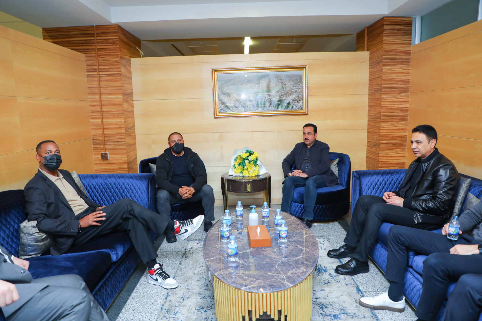 Erbil's local authorities greet former Brazilian footballer Roberto Carlos (top left) and Dutch player Patrick Kluivert (left) in the Kurdistan Region capital, Feb. 22, 2022. (Photo: Erbil Governorate/Facebook)