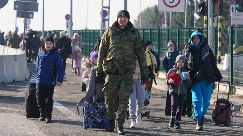 Ukrainian women and children cross the border from Ukraine to Poland at the Korczowa-Krakovets border crossing on Feb. 26, 2022. (Photo: Janek Skarzynski/AFP)