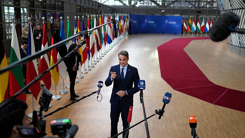 Greece's Prime Minister Kyriakos Mitsotakis speaks with the media as he arrives for an EU summit at the European Council building in Brussels on Thursday, Feb. 9, 2023. (Photo: Virginia Mayo/ AP)