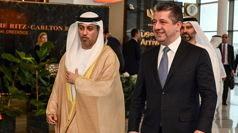 Kurdistan Region Prime Minister Masrour Barzani (right) is received by a United Arab Emirates official in Dubai, Feb. 12, 2023. (Photo: KRG)