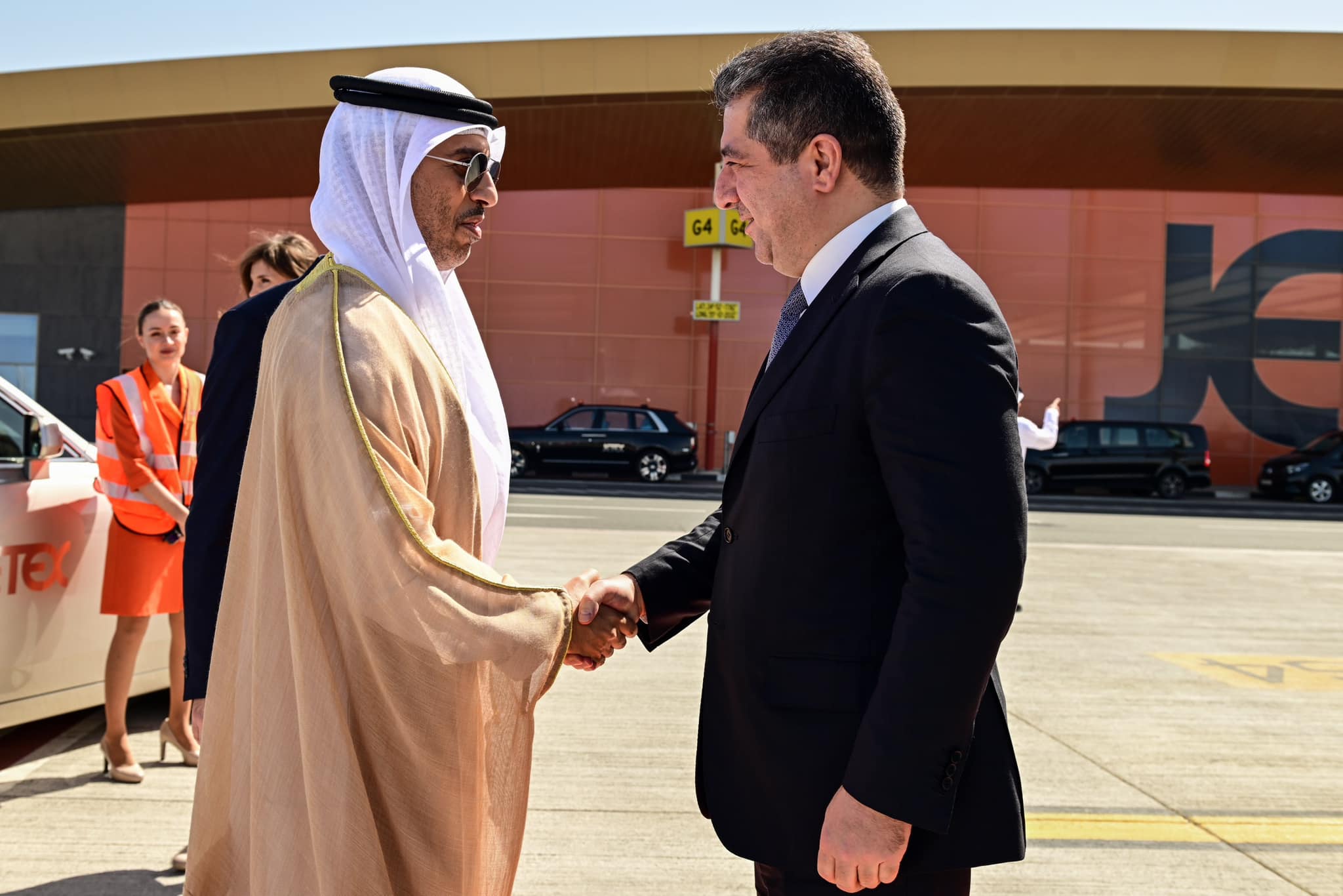 Kurdistan Region Prime Minister Masrour Barzani (right) is received by a United Arab Emirates official in Dubai, Feb. 12, 2023. (Photo: KRG)