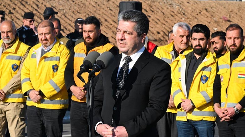 Kurdistan Region Prime Minister Masrour Barzani delivering a speech after the arrival of the Kurdish relief teams to Erbil, Feb. 19, 2023. (Photo: KRG)