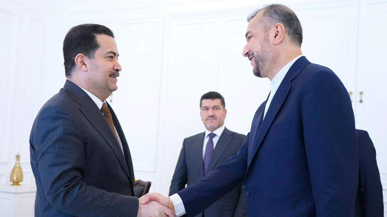 Iraqi Prime Minister Mohammed Shia' Al Sudani (Left) shaking hands with Foreign Minister of Iran Hossein Amir-Abdollahian, Feb. 22, 2023. (Photo: the Media Office of the Iraqi Prime Minister)
