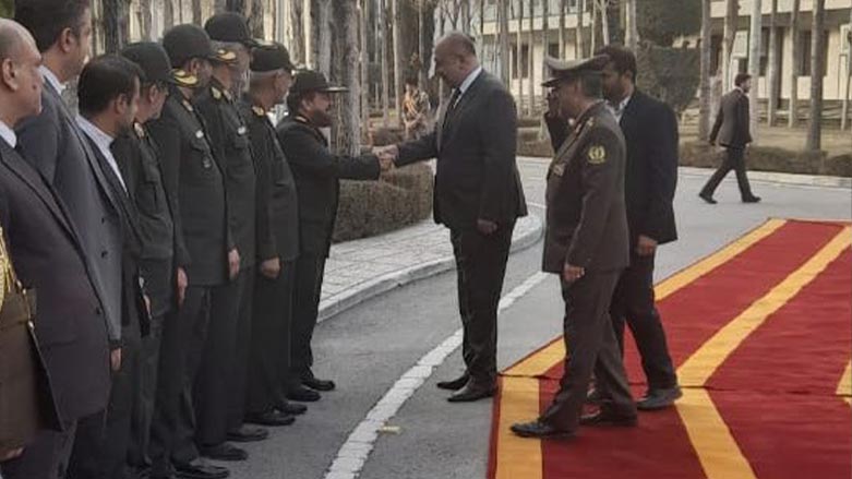 Thabet Muhammad Al-Abbasi, the Iraqi Minister of Defense, shaking hands with an Iranian officer, Feb. 25, 2023. (Photo: Iraqi Ministry of Defense/Twitter)