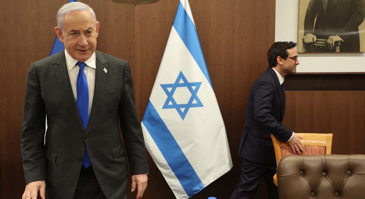Israeli Prime Minister Benjamin Netanyahu (L) takes a seat before his meeting with France's Foreign Minister Stephane Sejourne (R) in Jerusalem, Feb. 5, 2024. (Photo: Gil Cohen-Magen/AFP)