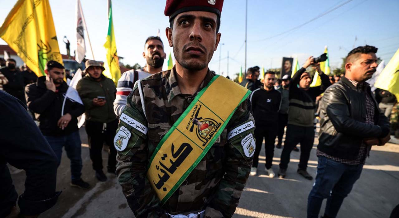 A member of Kataeb Hezbollah, attends the funeral of Abu Baqr al-Saadi, a senior commander of the armed group who was killed in a strike carried out a day earlier by an American drone that targeted his car in a vital neighbourhood in Baghda