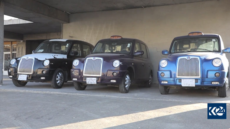 London-style cabs are parked in a row at a garage in the Kurdistan Region's Duhok province. (Photo: Kurdistan 24)