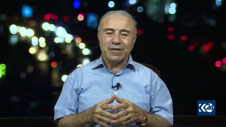 The co-founder and former president of the KNC, Abdul Hakim Bashar, during an interview with Kurdistan 24.