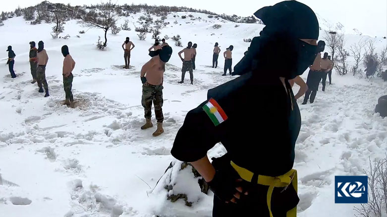 A group of ninja fighters practices their art in the snowy Mount Hassan Beg in Erbil province's Soran district. (Photo: Kurdistan 24)