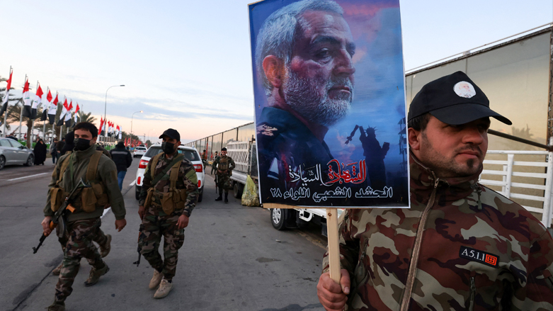 Members of the Iraqi Hashed al-Shaabi take part in a commemoration ceremony held to mark the second anniversary of the killing of Iranian general Qasem Soleimani and Abu Mahdi al-Mohandis, Jan. 2, 2021. (Photo: Ahmad al-Rubaye/AFP)