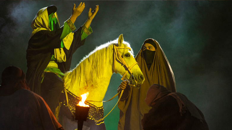 An actor in the role of the Imam Hussein, grandson of the Prophet Mohamed, enacts a scene from a play titled "The Resurrection of the Earth" produced by the Hashed al-Shaabi, Dec. 29, 2021. (Photo: Hussein Faleh/AFP)