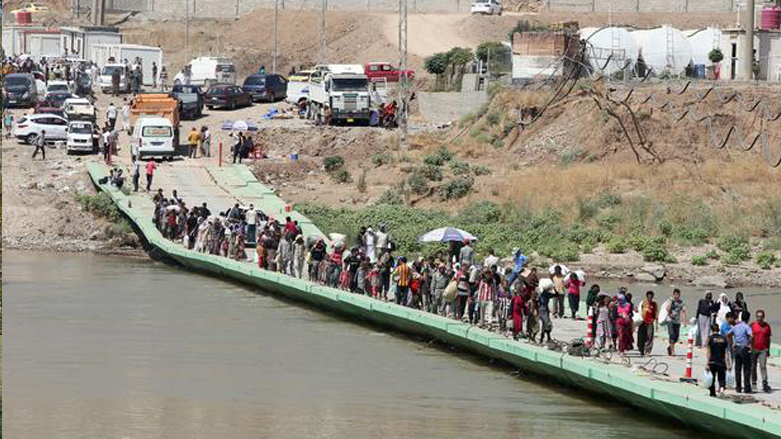Faysh Khabur border crossing between Kurdistan Region and north-east Syria. (Photo: Ahmad Al-Rubaye/AFP)