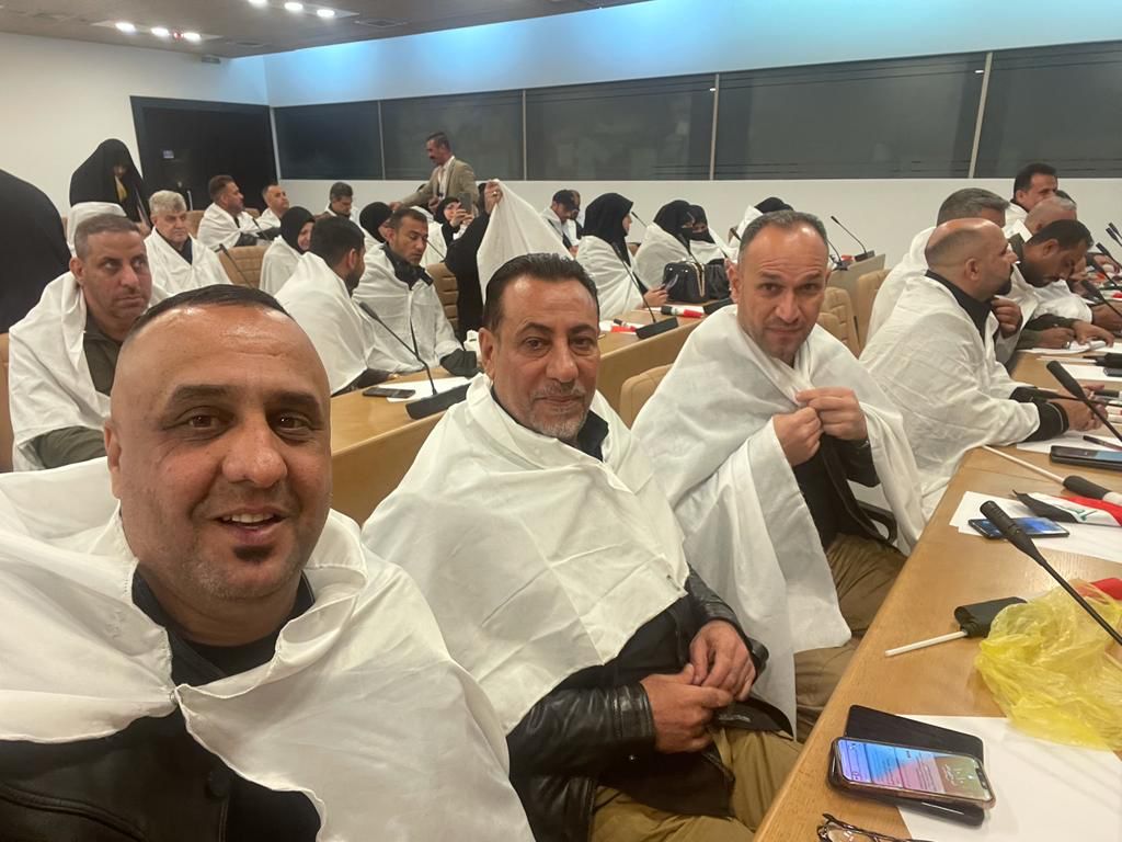 Sadrists' parliament members coming to the first session of the Iraqi parliament wearing white fabric used to bury the dead, Jan. 9, 2022. (Photo: Kurdistan 24)