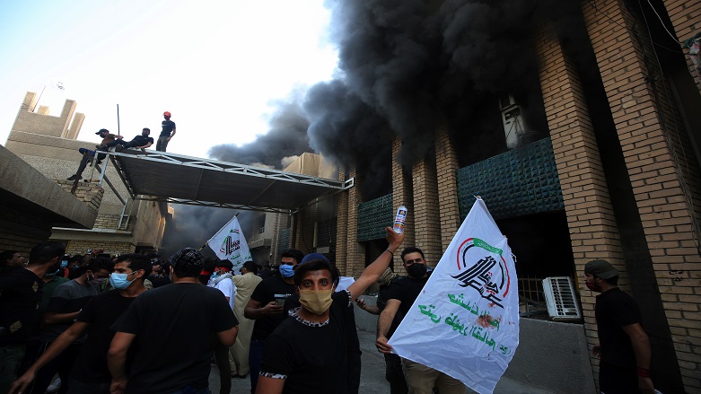 Pro-militia crowd sets Baghdad office of Kurdish KDP party on fire. (Photo: social media)