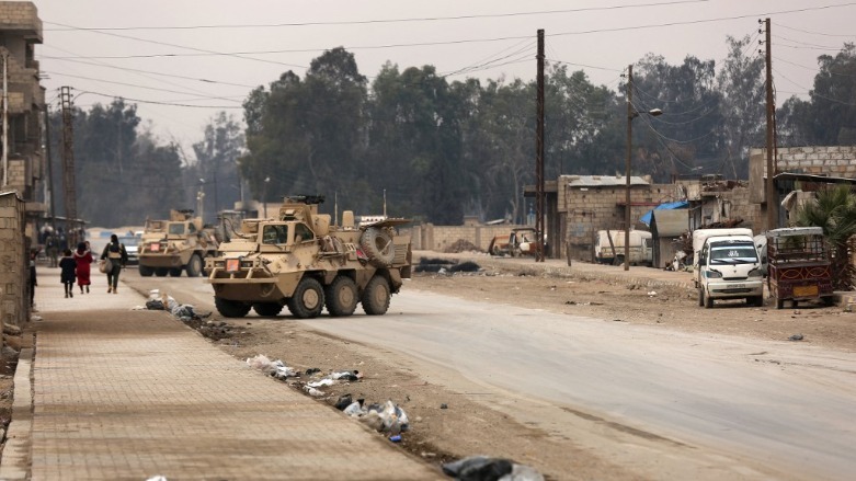 A vehicle belonging to the US-led coalition parks in a street in the northeastern Syrian city of Hasakah on January 24, 2022. (Photo: AFP)