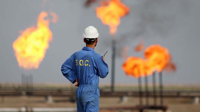 A worker from South Oil Company is pictured on a field in Nasiriyah, Oct. 30, 2015. (Photo: Haider Mohammed Ali/AFP)