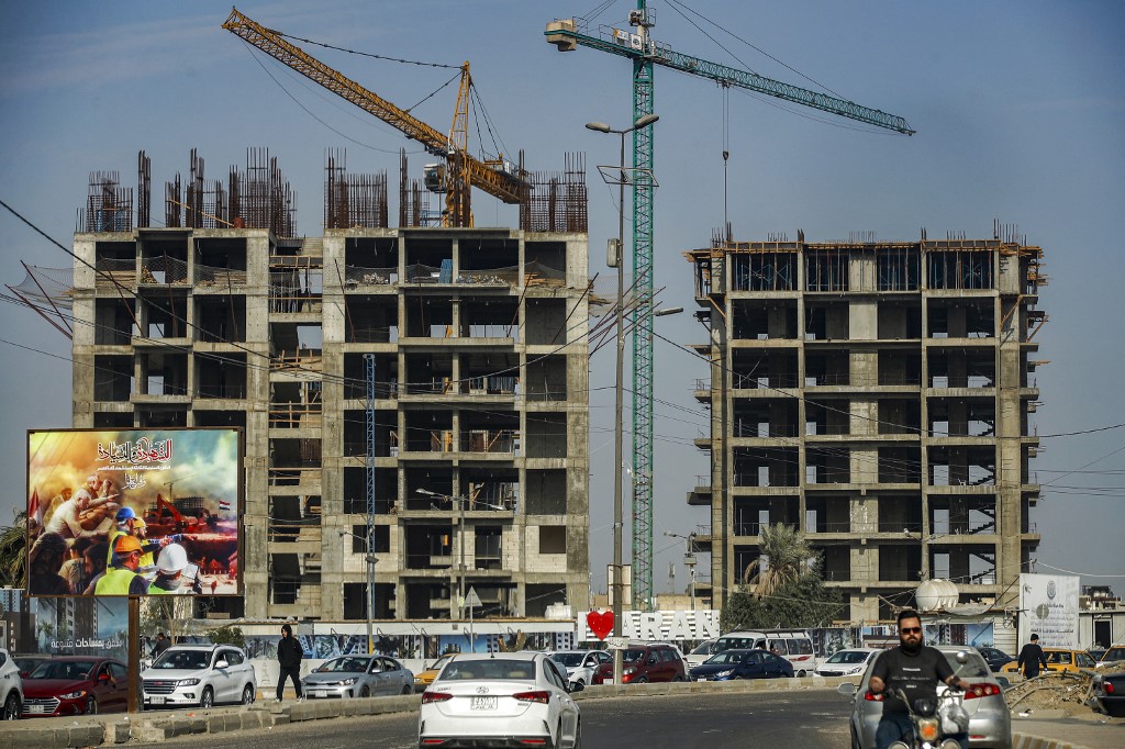 A view of unfinished apartment buildings at a housing complex in Iraq's capital Baghdad, Dec. 16, 2022. (Photo: Ahmad Al-Rubaye/AFP)