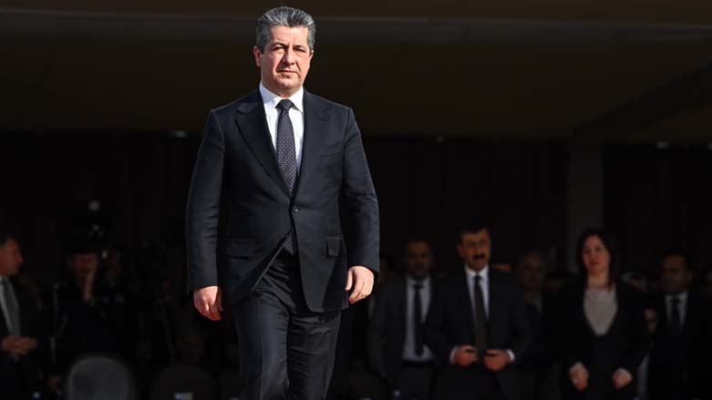 Kurdistan Region Prime Minister walking to deliver his speech at an event in the capital Erbil, 2022. (Photo: KRG)