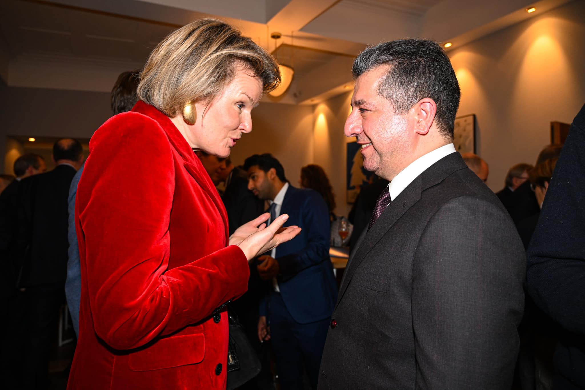 Kurdistan Region Prime Minister Masrour Barzani (right) speaking with Queen Mathilde of Belgium during an event titled 