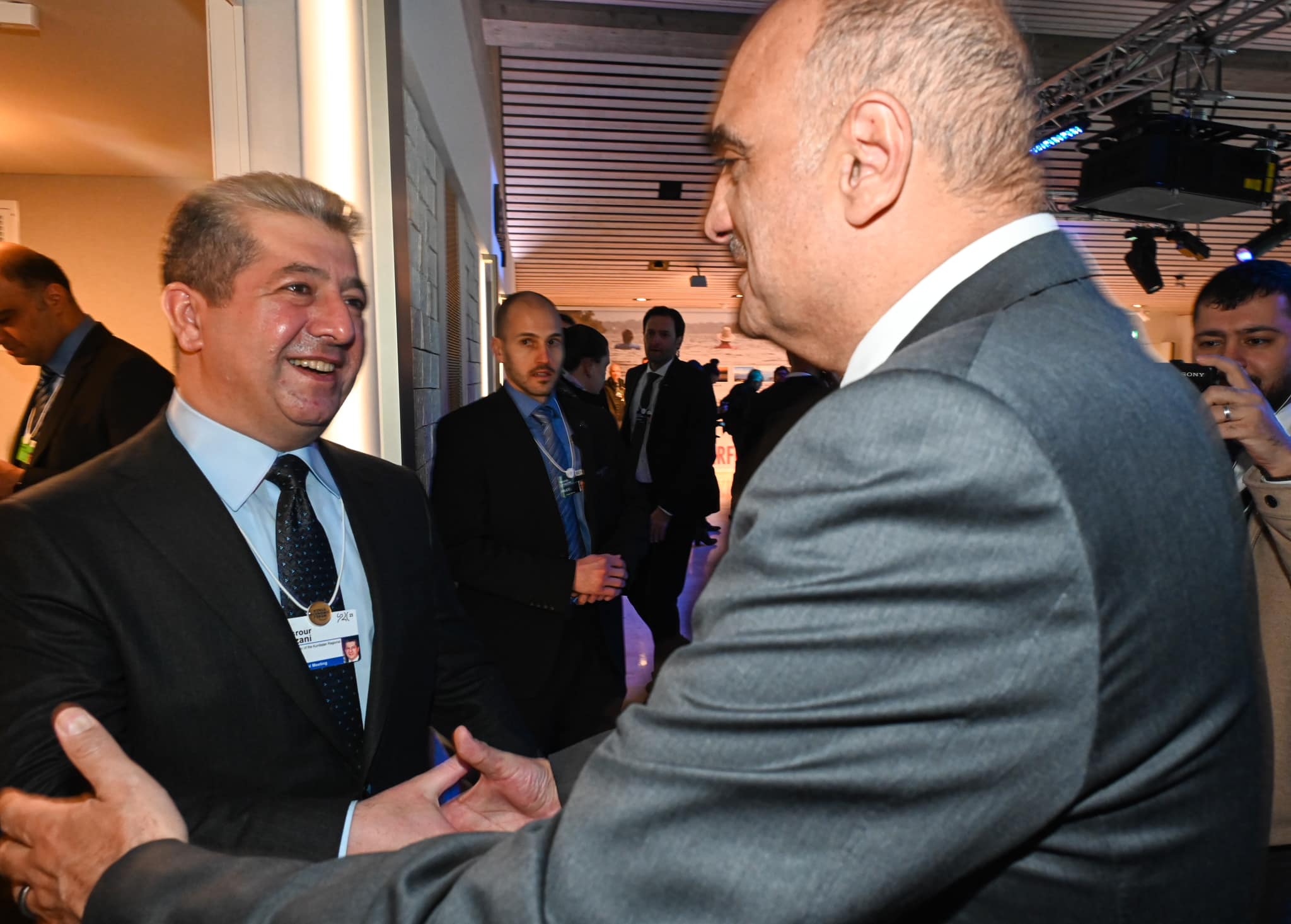 Kurdistan Region Prime Minister Masrour Barzani (left) shaking hands with his Jordanian counterpart Bisher Al-Khasawneh in Davos, Jan. 18, 2023. (Photo: KRG)