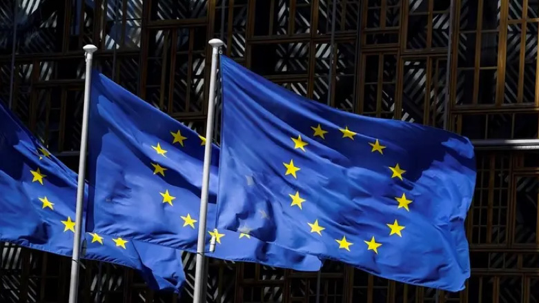 European Union flags fluttering in the air outside the European Commission building in Brussels. (Photo: AFP)