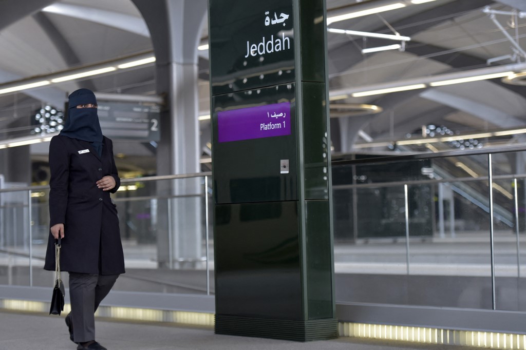 Saudi conductor Tharaa Ali, is pictured at the train station, in Saudi Arabia's Red Sea coastal city of Jeddah, Jan. 22, 2023. (Photo: Amer Hilabi/AFP)