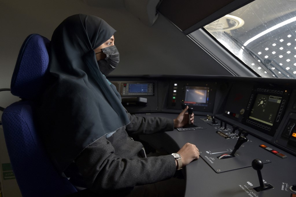 Saudi conductor Raneem Azzouz, drives a high-speed train ferrying pilgrims to Mecca, in Saudi Arabia's Red Sea coastal city of Jeddah, Jan. 22, 2023. (Photo: Amer Hilabi/AFP)