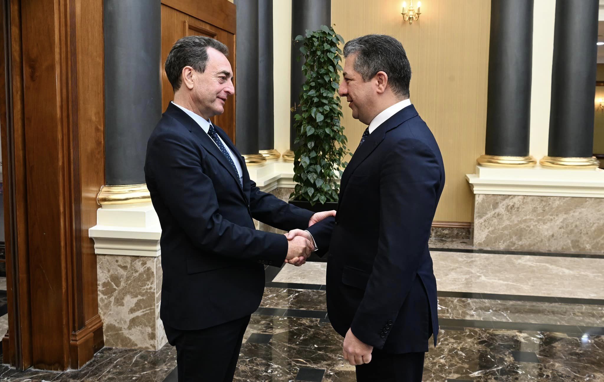 Kurdistan Region Prime Minister Masrour Barzani (right) shaking hands with outgoing French Ambassador to Iraq &Eacute;ric Chevalier in Erbil, Jan. 8, 2023. (Photo: KRG)