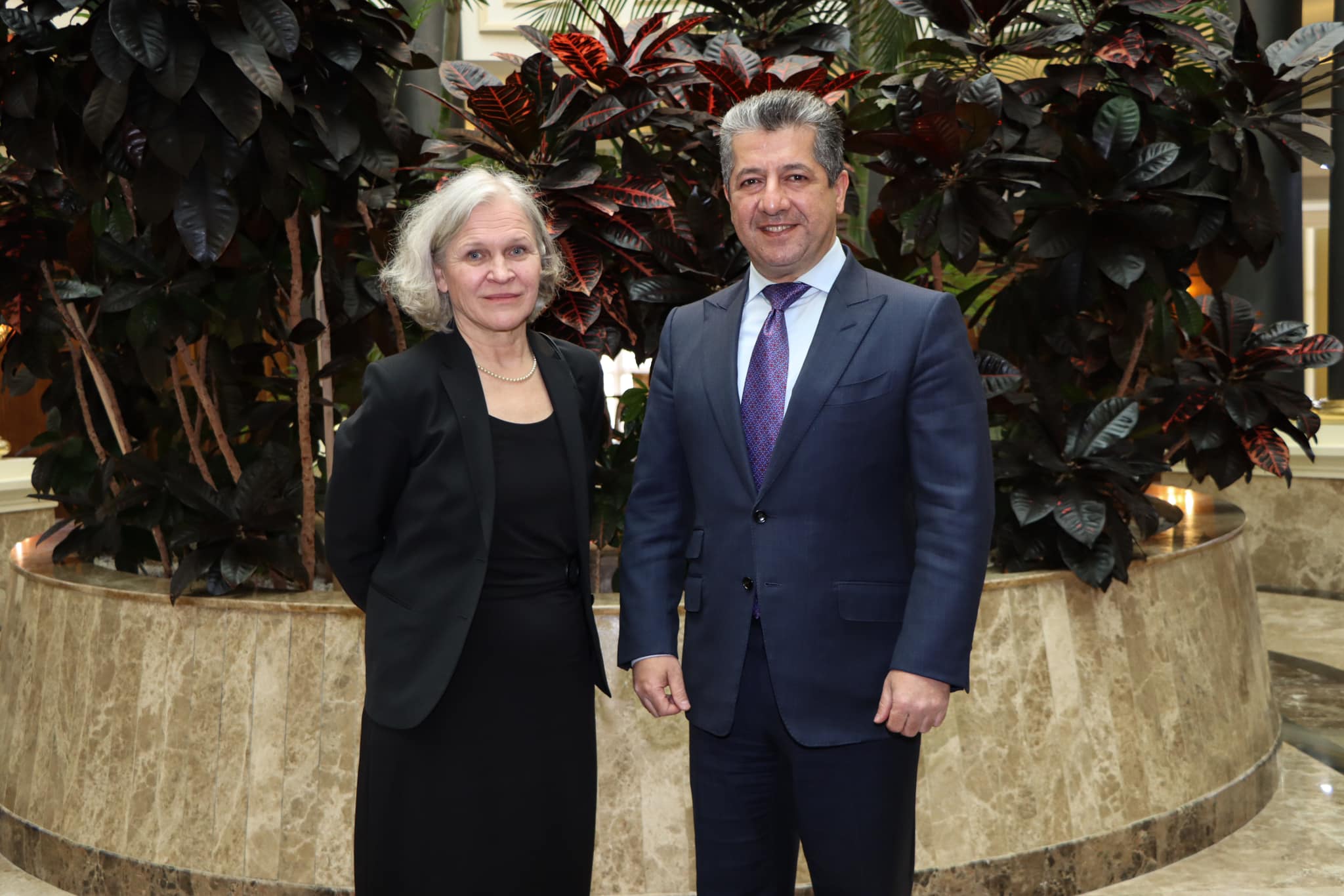 Kurdistan Region Prime Minister Masrour Barzani (right) posing for a photo with Ambassador of Finland to Iraq Anu Saarela in Erbil, Jan. 14, 2024. (Photo: KRG)