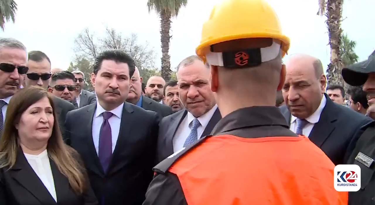 Members of the Iraqi parliament (left) are briefed by search and rescue workers at the site of Iranian ballistic missiles in Erbil, Jan. 21, 2024. (Photo: Kurdistan24)