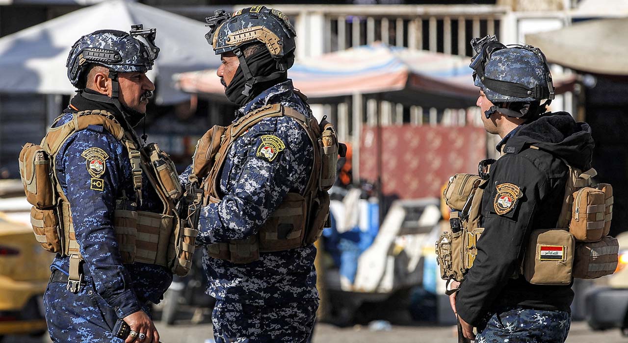 Iraqi security forces are stationed by the Freedom Monument in Baghdad's Tahrir Square, Dec. 26, 2023. (Photo: Ahmad Al-Rubaye/AFP)
