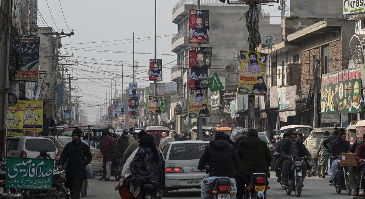 A street is festooned with flags of political parties ahead of Pakistan's national elections 2024, in Quetta, Jan. 21, 2024. (Photo: Banaras Khan/AFP