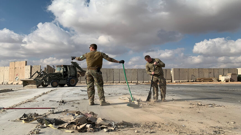 Soldiers from the international coalition against the ISIS clear debris from Ain al-Asad Airbase in the west of Iraq, Jan. 13, 2020. (Photo: Ayman Henna/AFP)