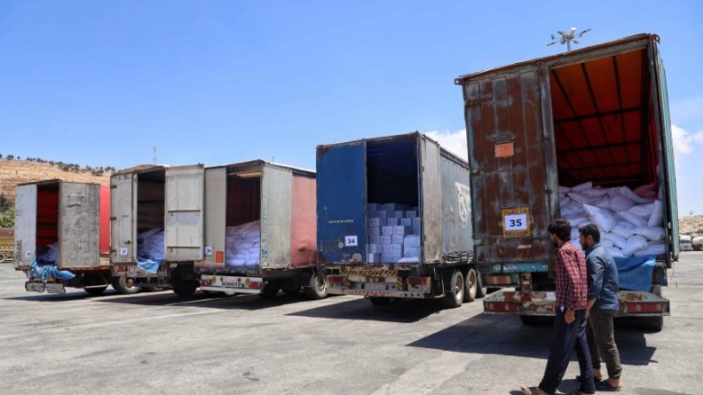 UN humanitarian aid trucks enter northwest Syria through the Bab al-Hawa border crossing with Turkey on June 1, 2021 (Photo: AP)