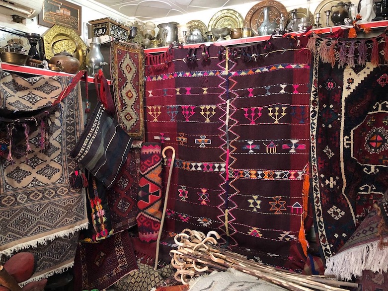 Handmade Kurdish rugs inside in Farsat Hassan Muhammad's souvenir shop, Duhok, July, 1, 2021 (Photo: Kurmanj Nheli) 