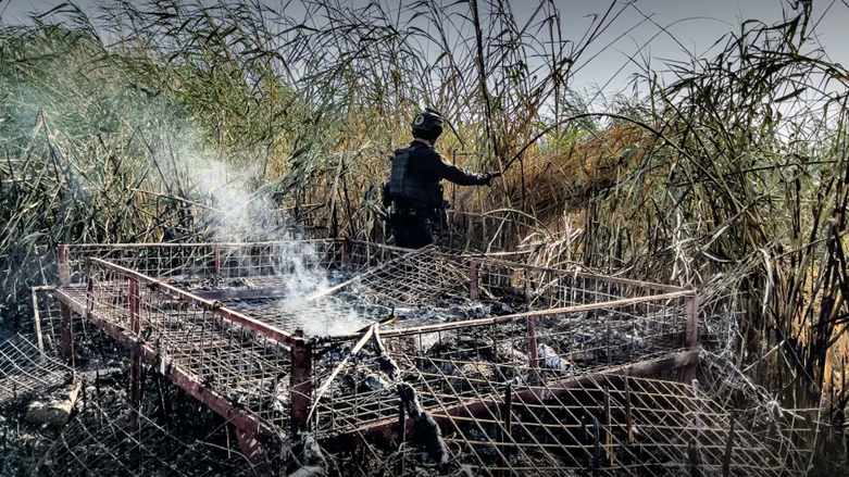 An Islamic State hideout, made from metal bed frames and meshes, and built inside an irrigation canal, is discovered by Iraqi troops. (Photo: The Guardian/Ghaith Abdul-Ahad)