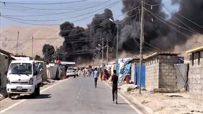 Smoke rises above a displacement camp in the Kurdistan Region. (Photo: Social Media)