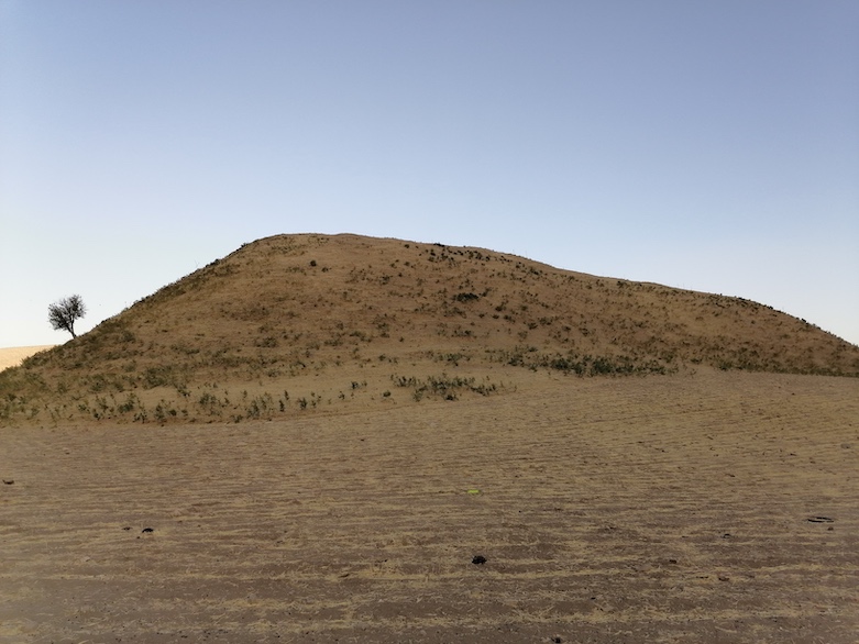 The mound of Gird-i Dasht, on the Soran plain, likely held a fortress in the Bronze Age, Iron Age, and Islamic periods. (Photo: Yadgar Ismail)