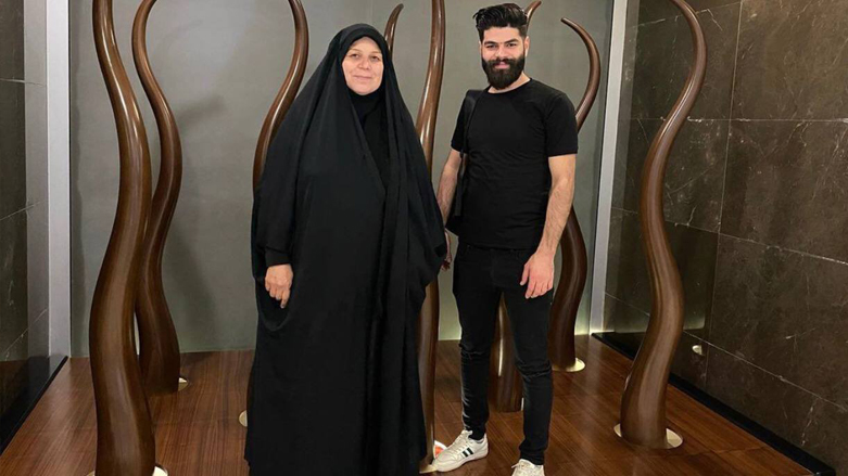 Iraqi activist Fatima al-Bahadili (left) poses for a photograph with her son Ali Kareem, who was found dead in Basra on Sunday. (Photo: Social Media)