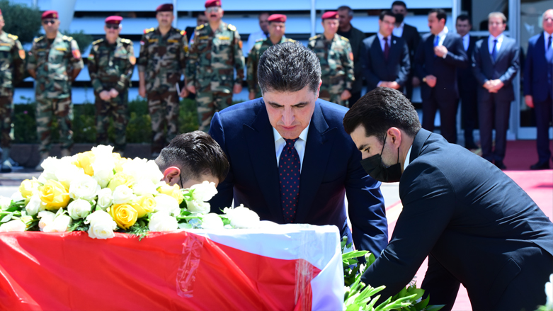 Kurdistan Region President Nechirvan Barzani put flowers by the body of 1-year-old child Zahra who was killed in the Turkish artillery bombardment on a resort site in the Kurdistan Region.