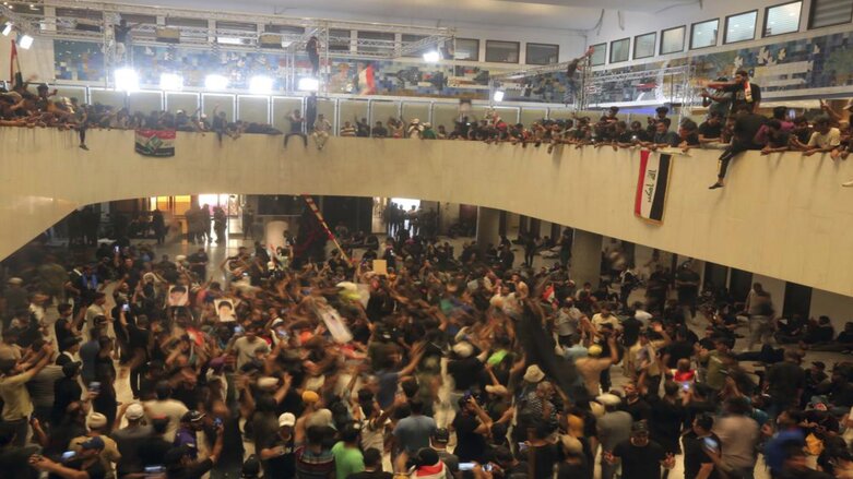 Iraqi protesters fill the Parliament building in Baghdad, July 30, 2022 as thousands of followers of an influential Shiite cleric breached the building for the second time in a week (Photo: Anmar Khalil/AP)