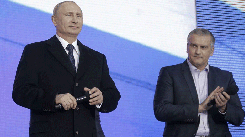 سێرگی ئەسکینۆڤی، سەرۆکی نیمچە دوورگەی کریمیا و ڤلادیمێر پوتن، سەرۆکی رووسیا