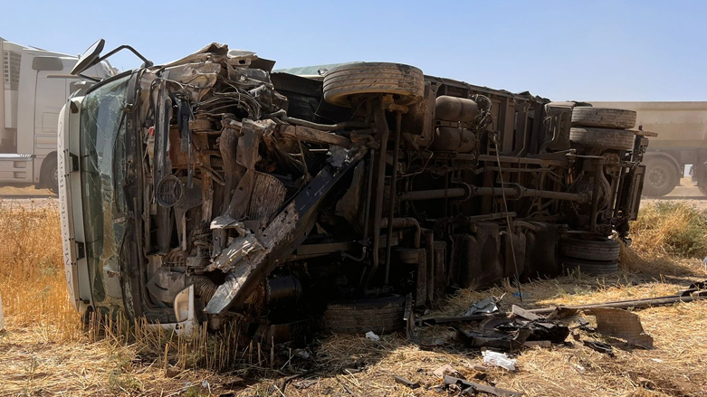 The crushed track laid on its side near Duhok province after an accident with a vehicle early Saturday, July 15, 2023. (Photo: Wa'ad Abdul Rahman/Kurdistan 24)