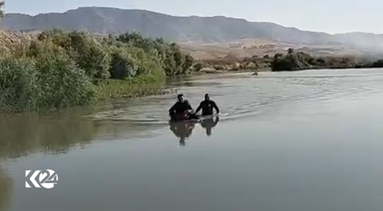 A rescue team searches for the deceased migrant in the Hezil River. (Photo: Kurdistan 24)