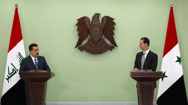 Syria's President Bashar al-Assad (R) listens to Iraq's Prime Minister Mohamed Shia al-Sudani during a press conference in Damascus, July 16, 2023. (Photo: Louay Beshara/AFP)